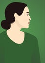 portrait of cute modest European woman on green background with black hair in a bun